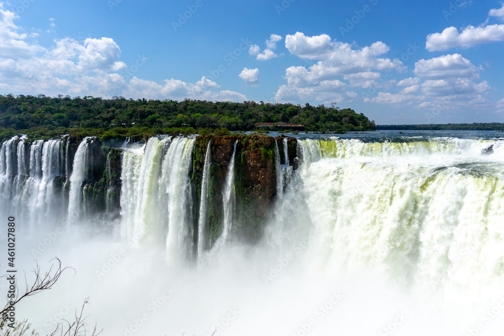 Iguazu Falls, located on the border of Argentina and Brazil, is the largest waterfall in the world. Iguazu Falls, located on the border of Argentina and Brazil, is the largest waterfall in the world.