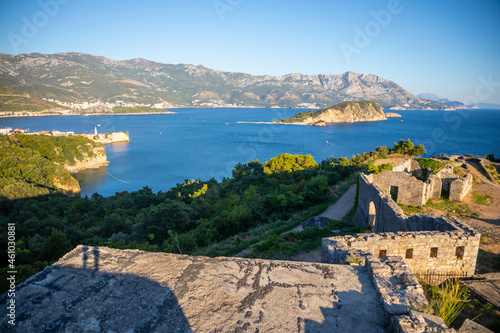 Ruins of medieval fortress Tvrdava Mogren at the shore of Adriatic sea, Montenegro. photo