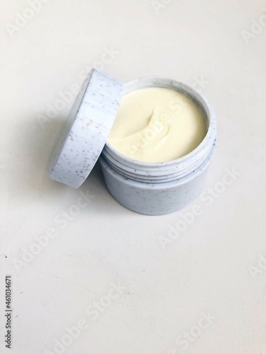Biodegradable jar of face cream on a table