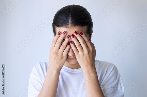 Wallpaper Mural Young girl covering her face with her hands Torontodigital.ca