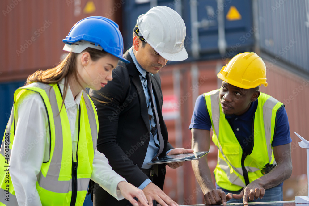 Team engineers discussing new project about to invest in install solar cells outside building or industrial factory Team engineers discussing new project about to invest in install solar cells outside building or industrial factory