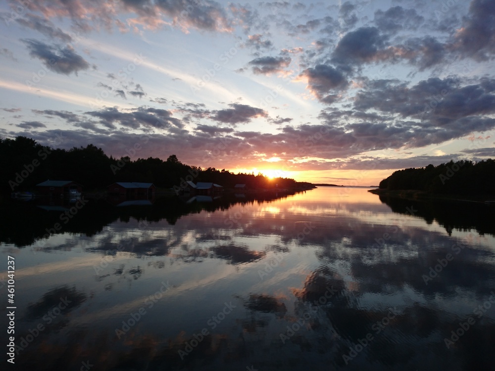 Colorful sunset with few clouds on the islands of Aland, Finlad