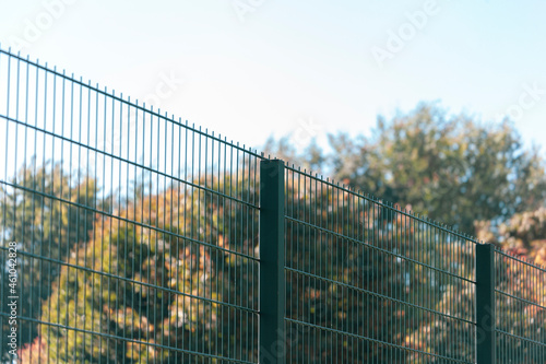 Texture of cradled metal or synthetic mesh on the fence for backgrounds