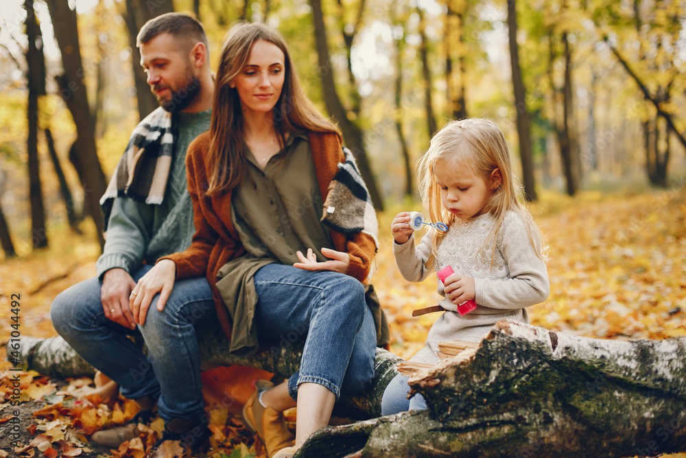 Fototapeta premium Family with cute kids in a autumn park