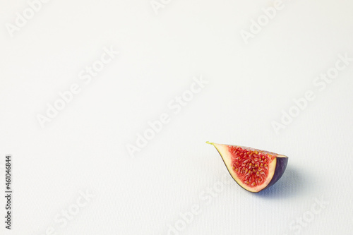 slice of fig on wthite background photo