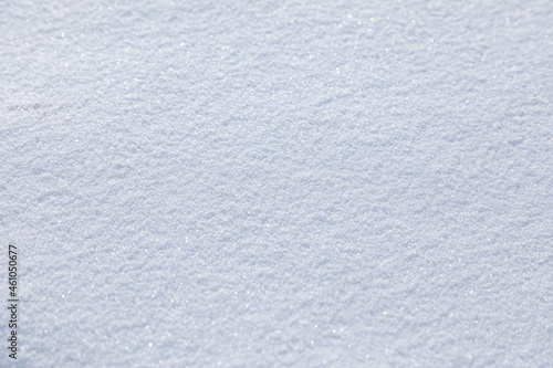 Natural snow texture. Smooth surface of clean fresh snow. Snowy ground. Perfect for Christmas and New Year design.