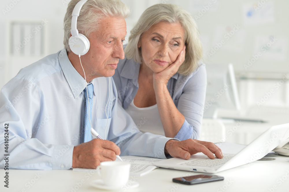Portrait of successful senior businesspeople working together in modern office Portrait of successful senior businesspeople working together in modern office