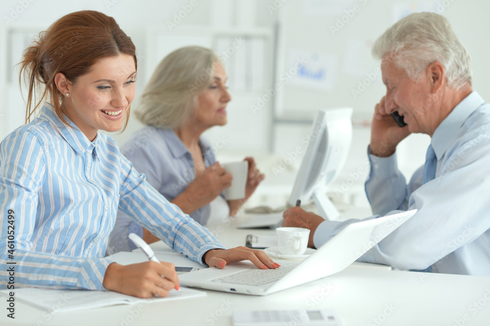 Portrait of group of successful business people in modern office Portrait of group of successful business people in modern office