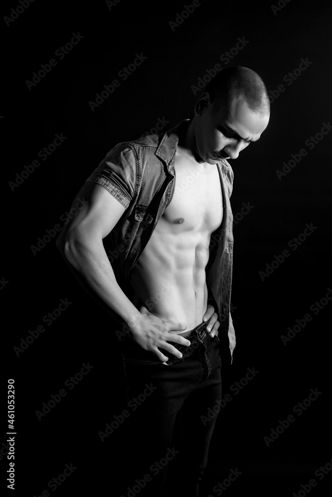 The muscular egyptian male on black background. Sexy naked torso. Sport workout bodybuilding concep. Muscular torso and chest. Isolated on black background.