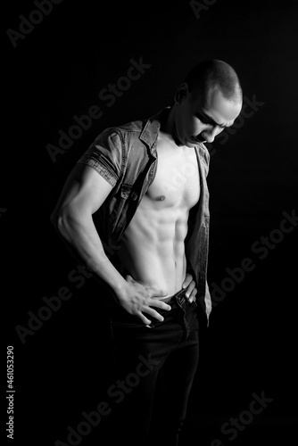 The muscular egyptian male on black background. Sexy naked torso. Sport workout bodybuilding concep. Muscular torso and chest. Isolated on black background.