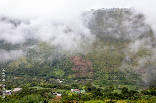 Mist and houses in Intag valley, Ecuador © Julian