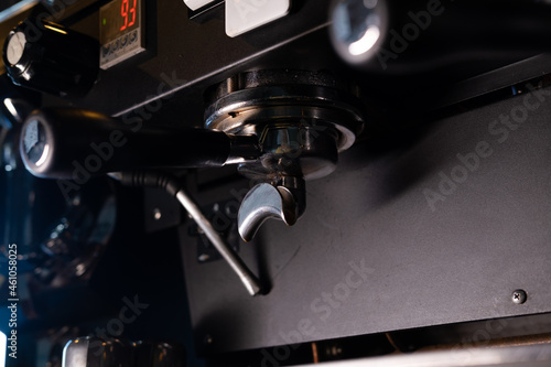close up of a professional coffee machine. loft dark coffee shop