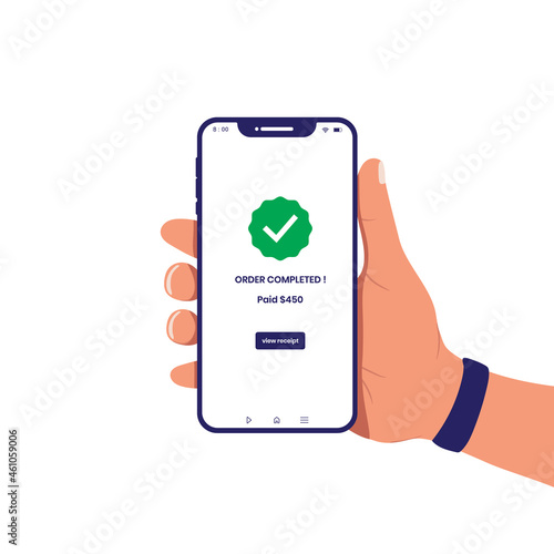 Hand holding smart phone with order completed message on screen