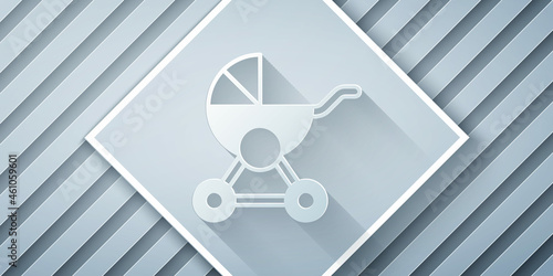 Paper cut Baby stroller icon isolated on grey background. Baby carriage, buggy, pram, stroller, wheel. Paper art style. Vector