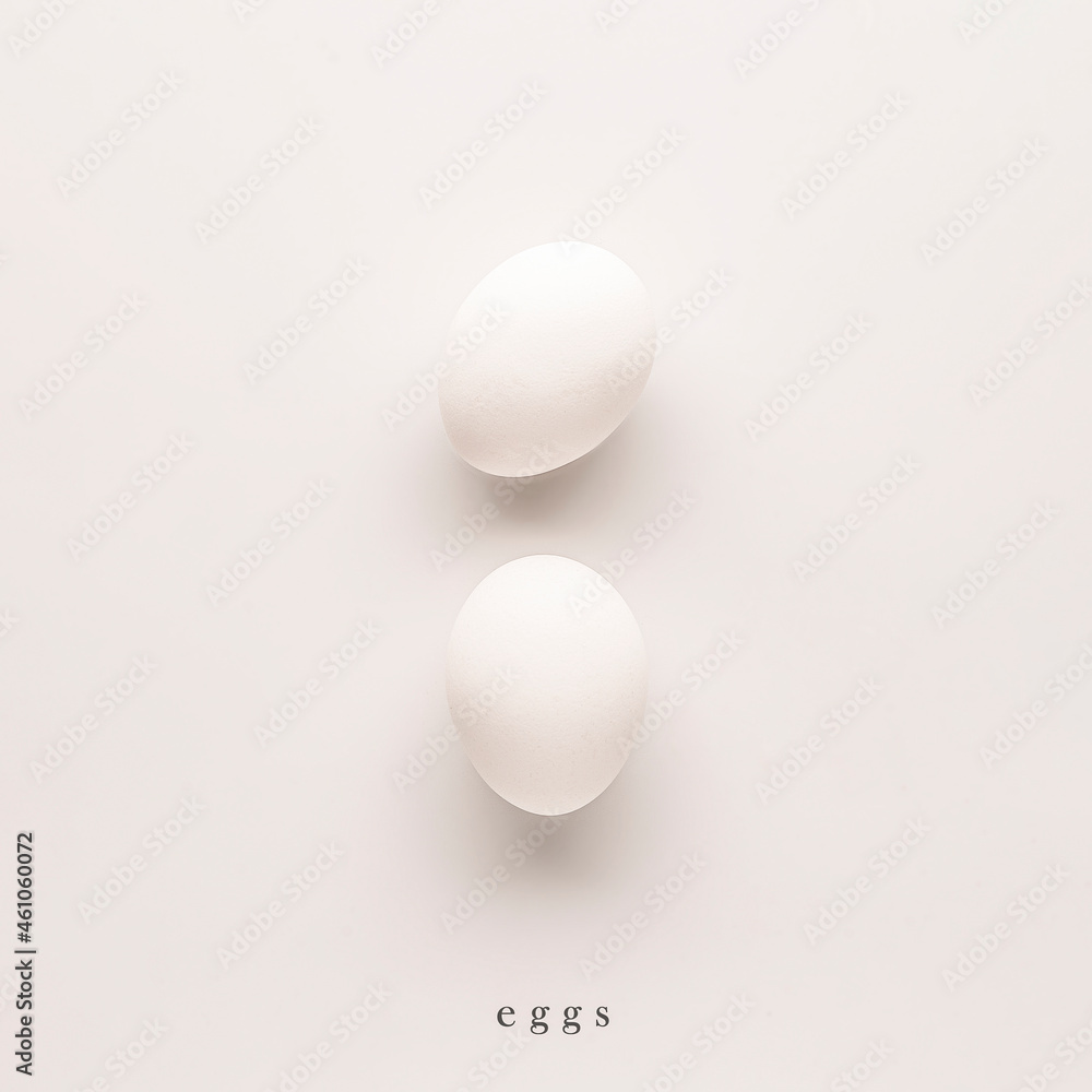 two eggs in a shell on a white background. graphic photo for interior design two eggs in a shell on a white background. graphic photo for interior design