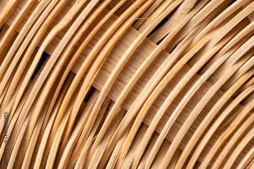 Close-up of a part of a circular object made by weaving thinly sliced bamboo