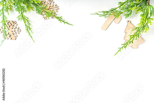 Fototapeta Naklejka Na Ścianę i Meble -  Christmas new year background with handmade wooden eco fir tree decorations, top view