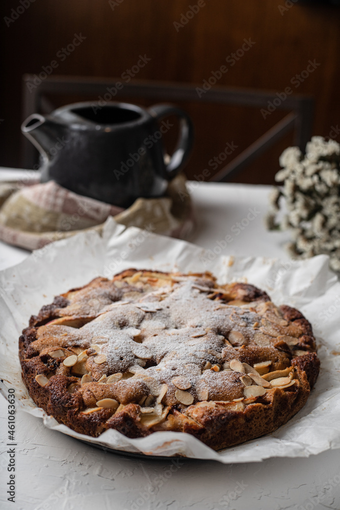 apple pie with a tea kettle in the background