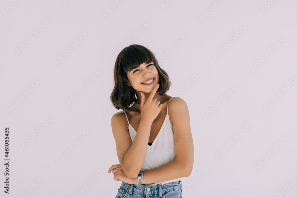 Portrait of young thinking woman isolated on white background. Portrait of young thinking woman isolated on white background.