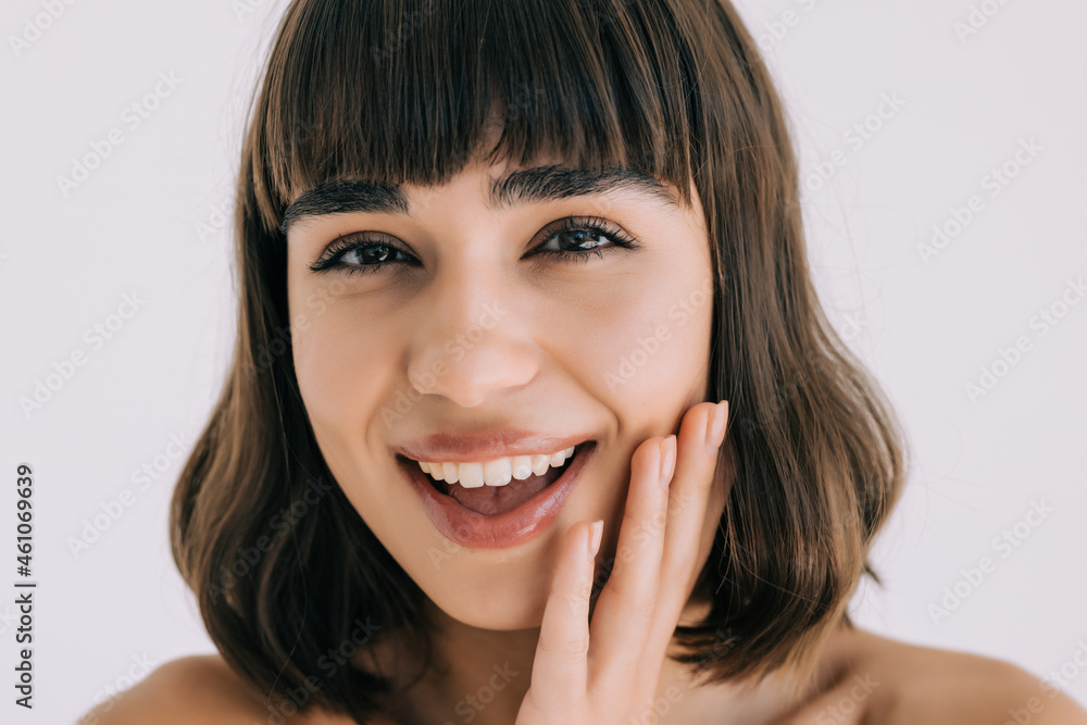 Young woman beauty face portrait on white background Young woman beauty face portrait on white background