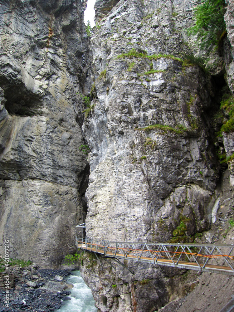 river between cliff