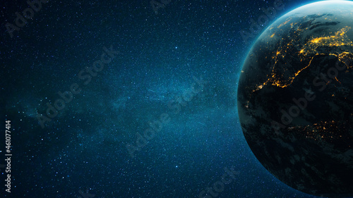 Fototapeta Naklejka Na Ścianę i Meble -  Amazing deep space with stars and a blue planet Earth with city lights at night. Space for design and text.