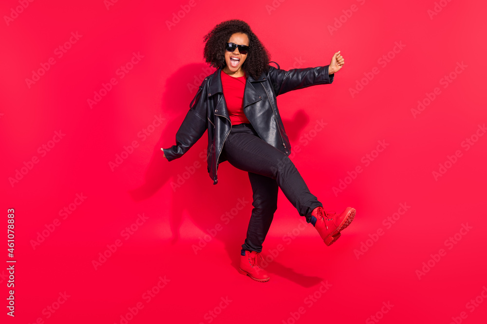 Full length photo of overjoyed cheerful person have fun vibe good mood isolated on red color background
