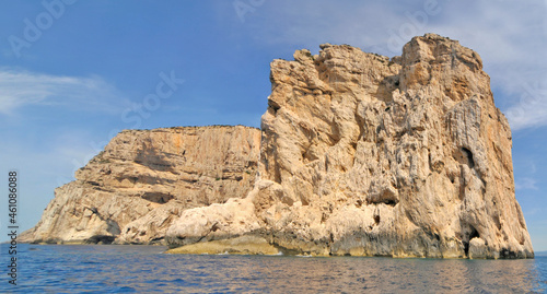 Limestone cliffs of the Capo Caccia cape at the Gulf of Alghero, Sardinia, Italy 