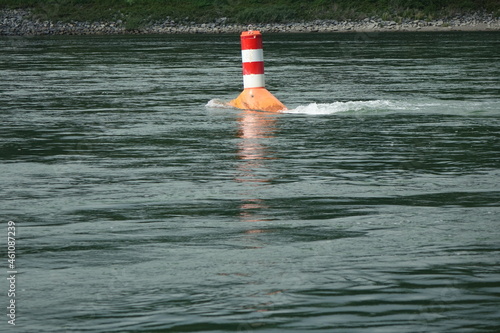 Red and white buoy marking the Rhine fairway between Plittersdorf, Rastatt, Germany and Seltz, France photo