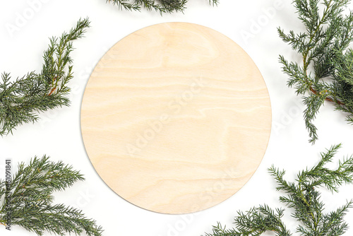 Canvas-taulu Blank empty round wood sign on white background with christmas blanket, christma