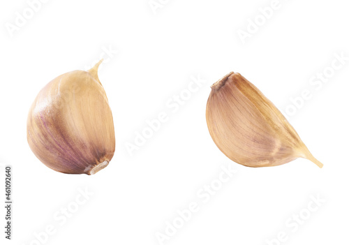 unpeeled cloves garlic isolated on white background.