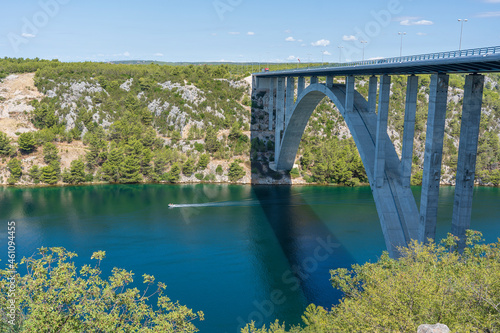 View on Krka river, autostrada and arch bridge at summer in Croatia, Europe