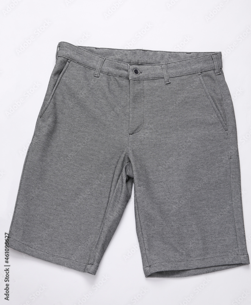 Gray shorts on a white background. Top view Gray shorts on a white background. Top view