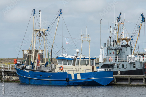 fishing boats laying in the harbor of Lauwersoog in summer