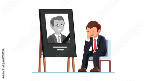 Business man mourning over death of colleague