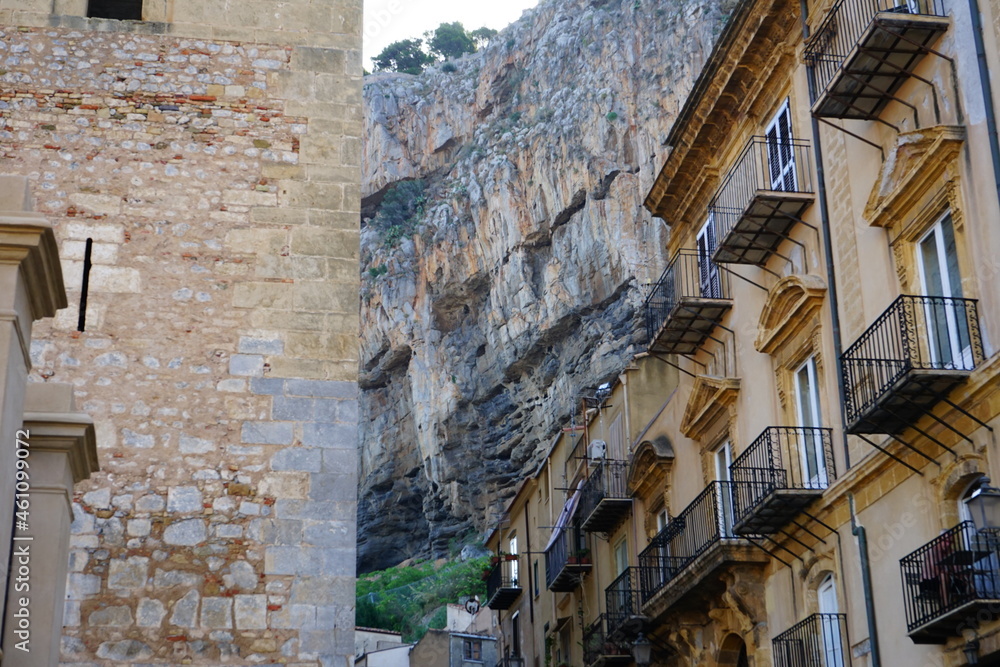 Typical Cefalù narrow street close to the mountain, Palermo, Sicily, Italy