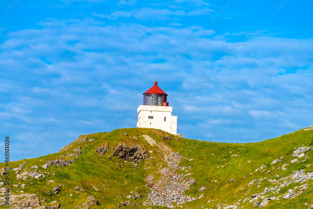 The lighthouse of Runde Island on the west coast of Norway, famous for its enormous number of birds The lighthouse of Runde Island on the west coast of Norway, famous for its enormous number of birds