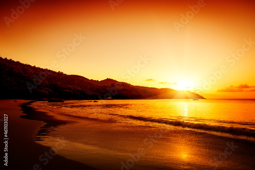 Gold sunset on the sand beach © Igor Chaikovskiy
