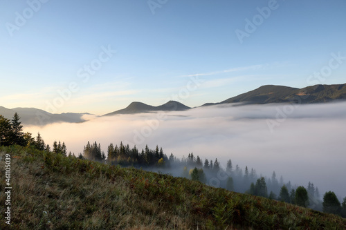Picturesque view of fog in mountains on morning © New Africa