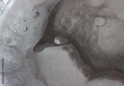 Close up Silicone based Wall paint gray color in a bucket