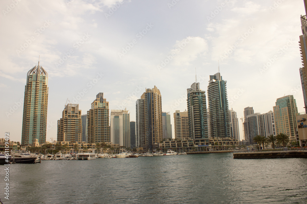 beach, yachts and high-rise buildings in Dubai
