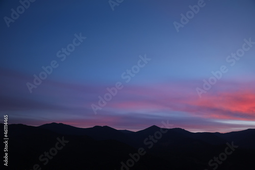 Picturesque view of mountain landscape and beautiful sunset sky