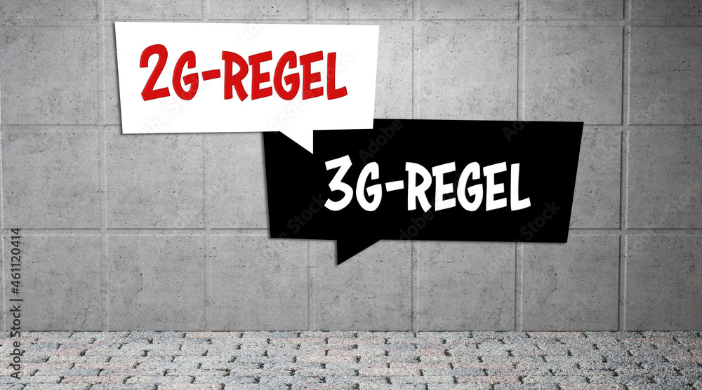 speech bubbles with the German word for 2G or 3G rule (which stands for vaccinated, cured or tested) on a concrete wall - obrazy, fototapety, plakaty 