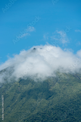 vertical as of the arenal volcano with clouds