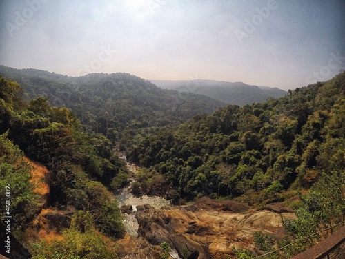 View of a valley and mountains from Dudhsagar waterfall bridge located in Kulem, Goa, India