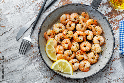 Tasty fried shrimps on pan
