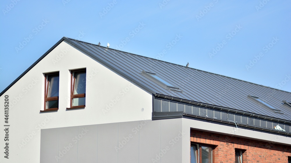 Modern single family terraced homes. Newly built homes in a residential estate. Modern single family terraced homes. Newly built homes in a residential estate.
