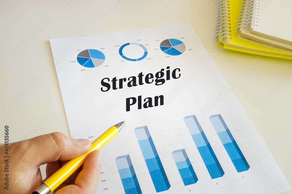Business concept meaning Strategic Plan with sign on the chart sheet. Business concept meaning Strategic Plan with sign on the chart sheet.