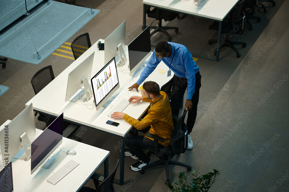 Managers works on computers, workplace in office Managers works on computers, workplace in office