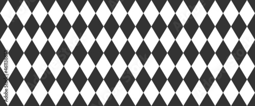 Harlequin seamless pattern. Geometric background with with black and white rhombus. Circus or masquerade ornament. Vector flat illustration.